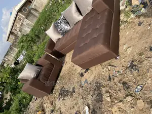 A Brown L Shape Sofa