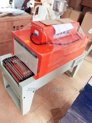 Semi Automatic Shrinking Wrapping Machine.