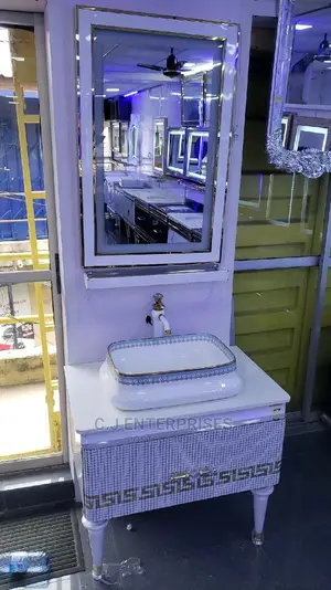 White Cabinet With Mirror and Shelf