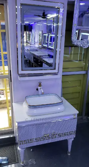 White Cabinet With Mirror and Shelf