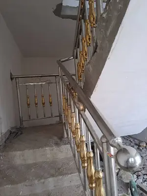 Stainless Handrails With Gold Designs