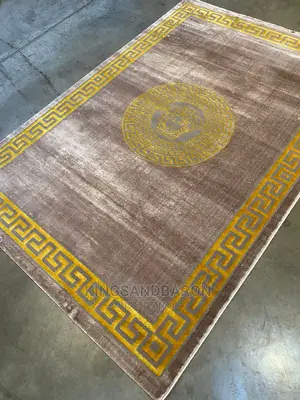 5×7fts Brown and Gold Center Rug