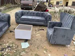 A Standard Luxury Seater With Center Table