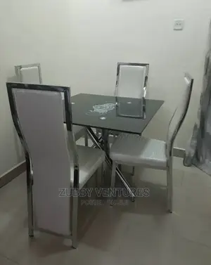 Brand New Quality Glass Dining With Four Chairs