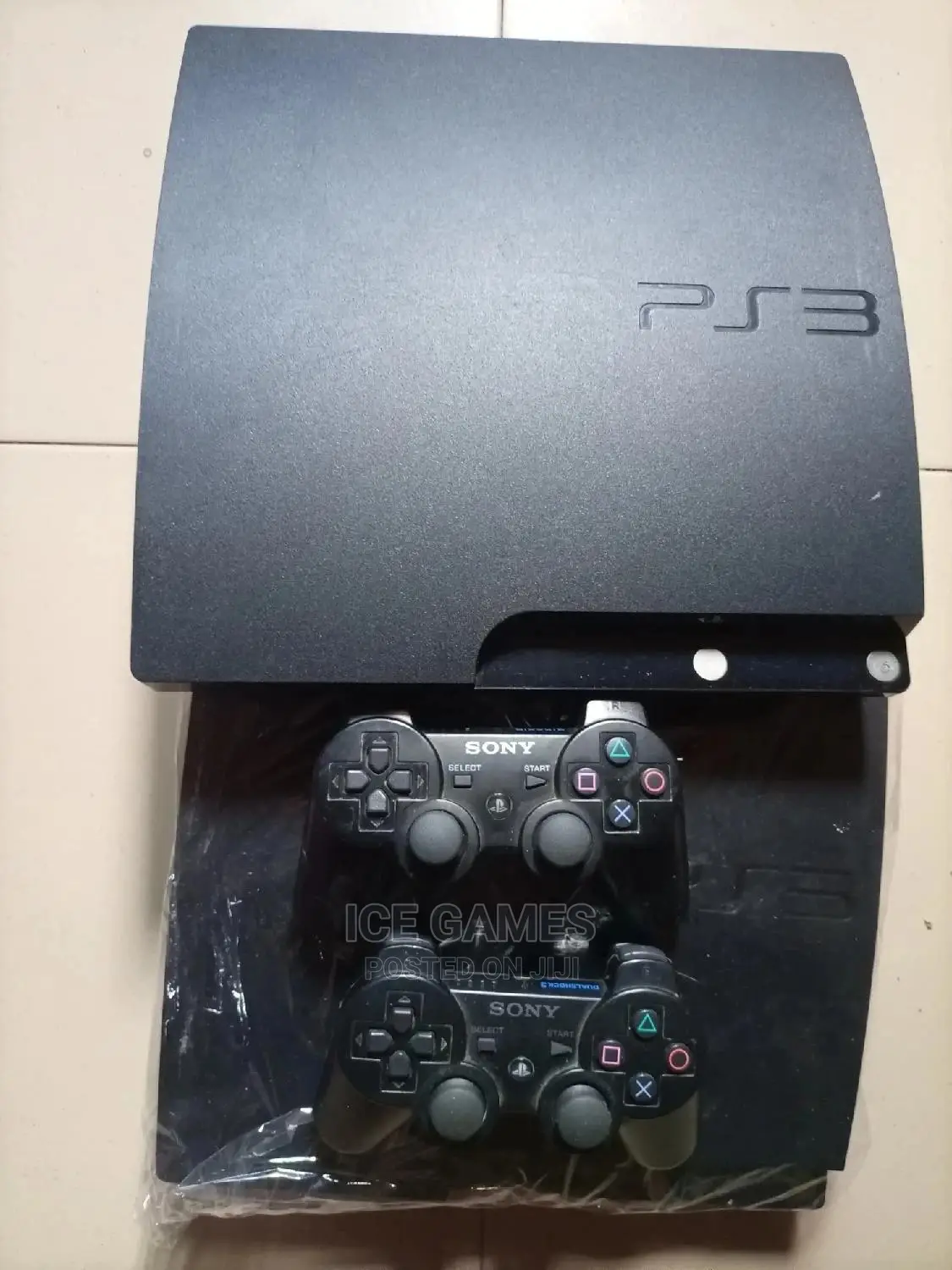 PS3 Slim With 1 Controller and 12 Games Installed
