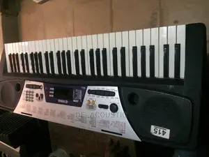 Yamaha EZ 150 Portable Keyboard With Adaptor