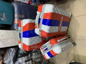 Set of 3 Multicolored Plastic Traveling Luggage