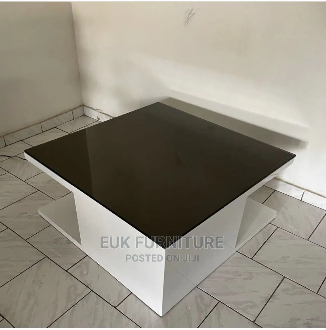 Simple and Unique Glossy Center Table