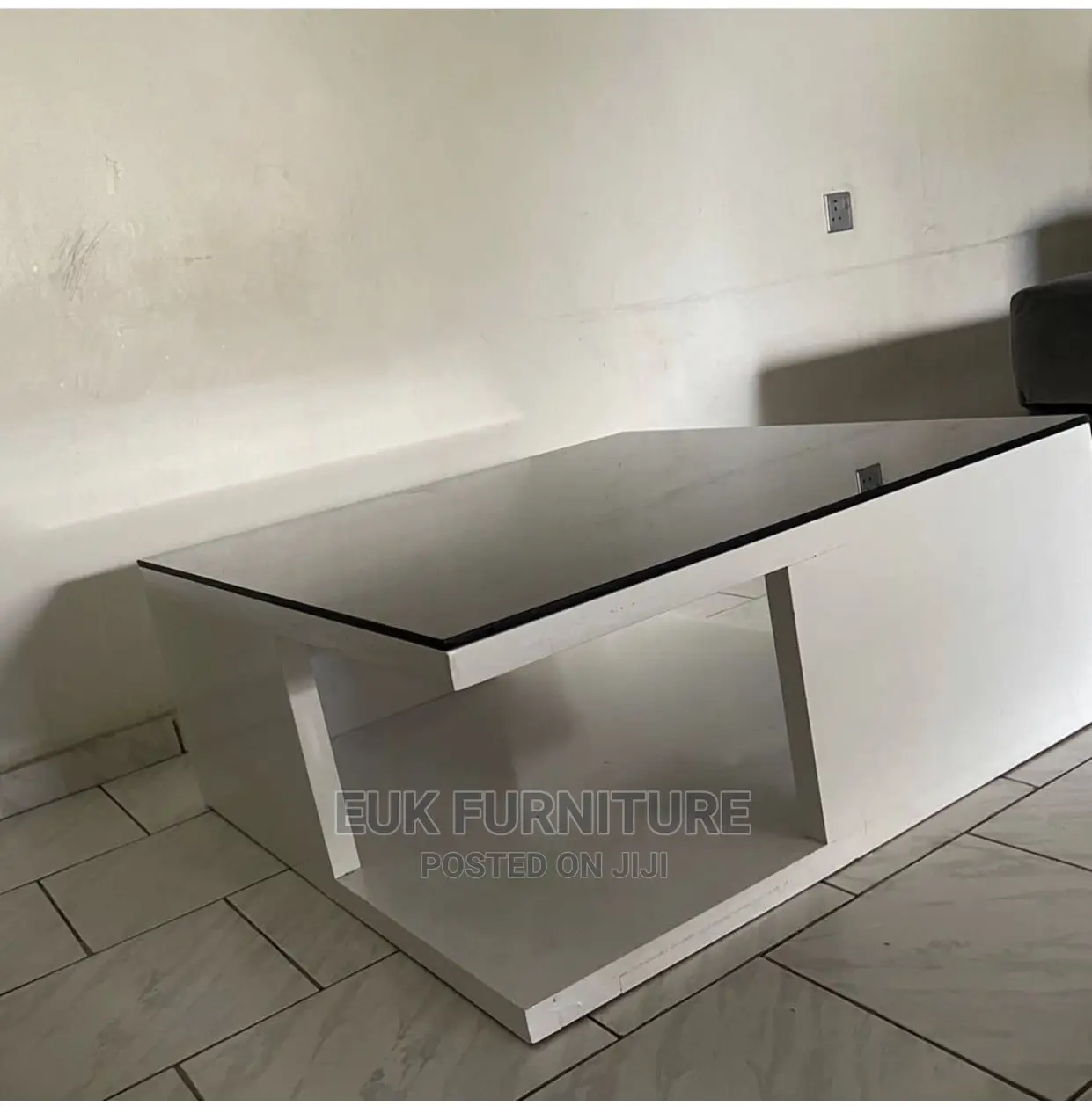 Simple and Unique Glossy Center Table