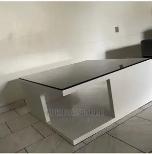 Simple and Unique Glossy Center Table