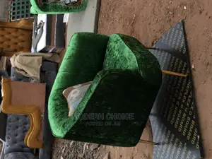 Single Seater Arm Chair With Throw Pillow Up for Grab