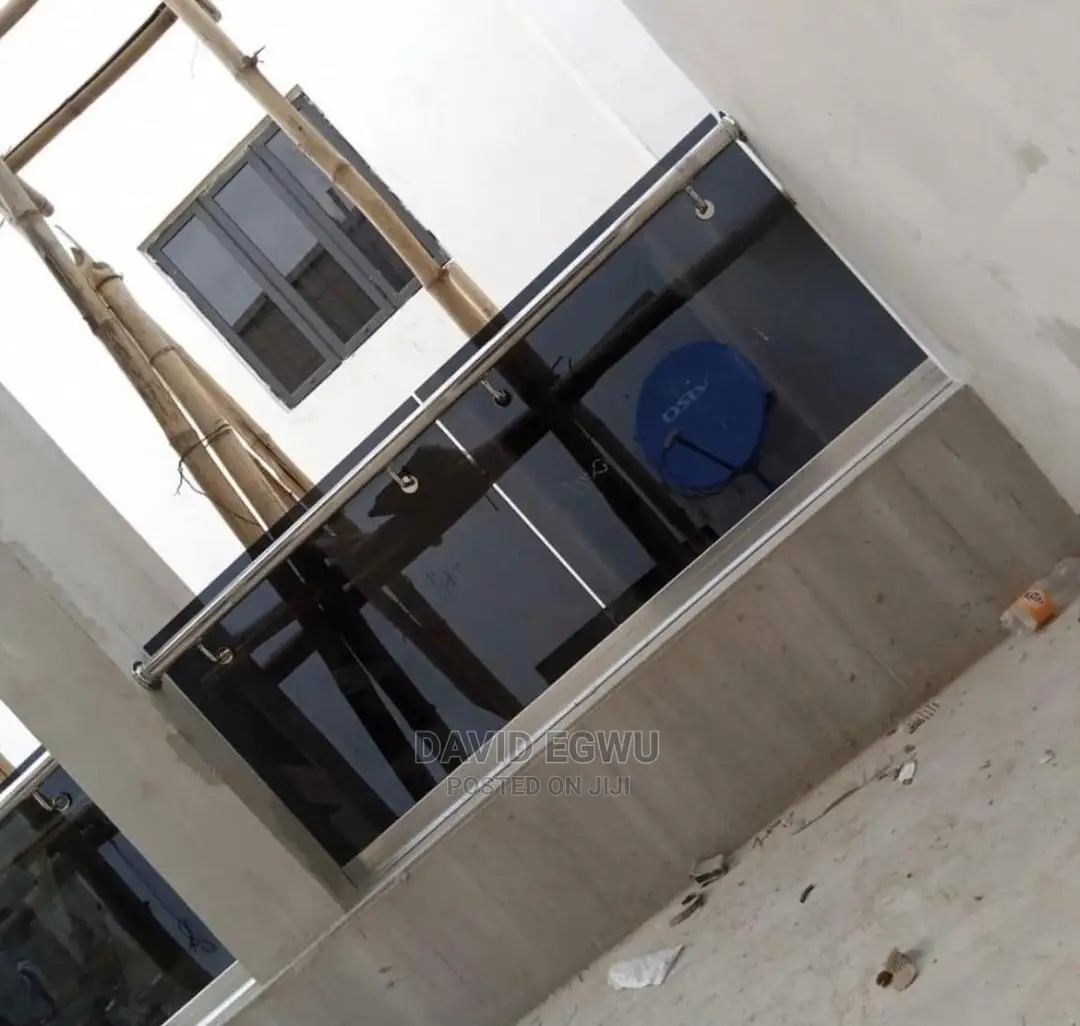 Framless Balcony With Tampered Grey Glass