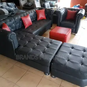 Photo - Black Lshap Red Troll Pillows With Single N Ottoman