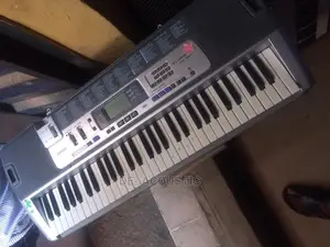 Casio LK-100 Lighted Keyboard With LCD Display