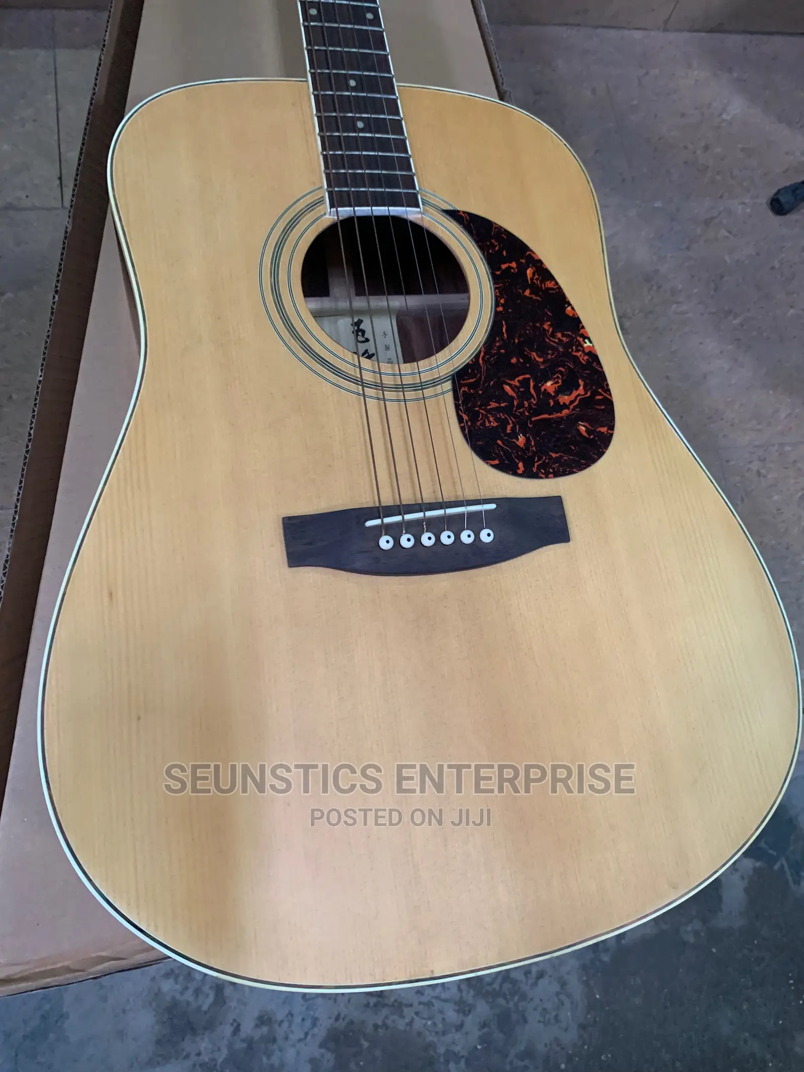 Quality O- Bong Acoustic Guitar