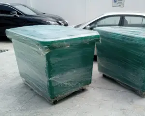 1100 Litre Robust Plastic Waste Bin Rolling on 4 Tyres