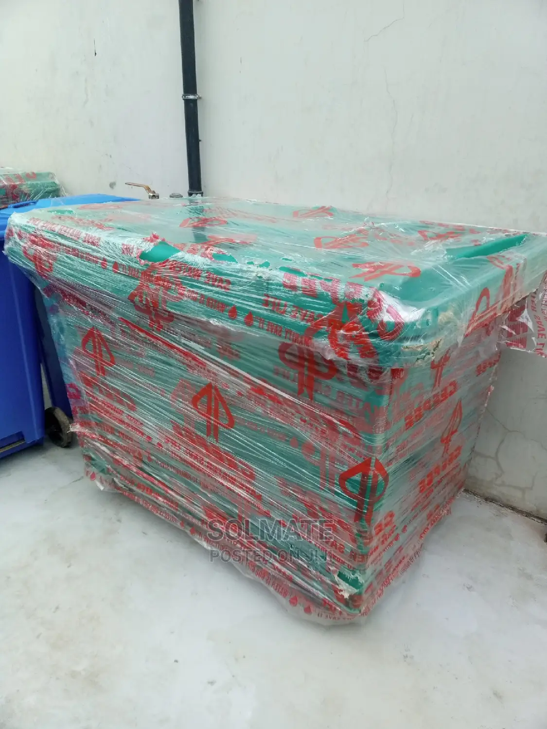1100 Litre Robust Plastic Waste Bin Rolling on 4 Tyres
