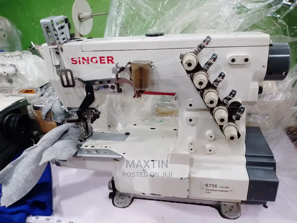 Singer Taping Machine
