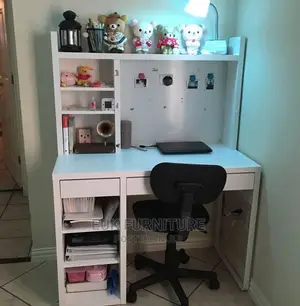 A Table and a Shelving Like Unit