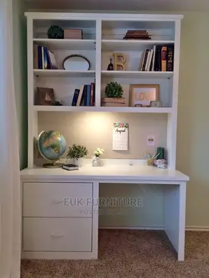 A Table and a Shelving Like Unit