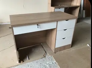 A Fine Table With Carved Openings on Each Drawers