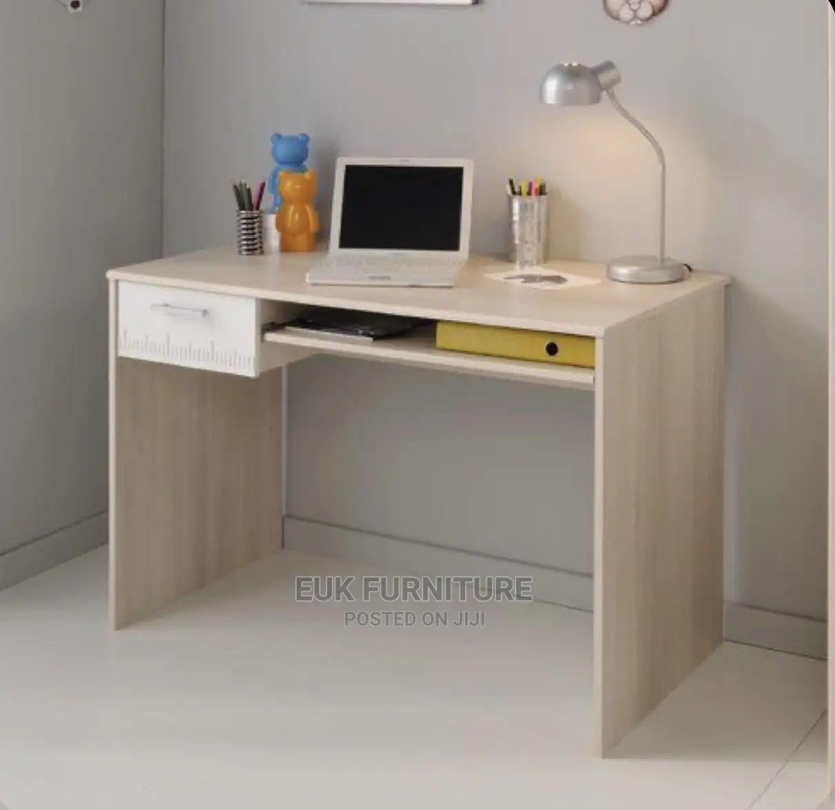 A Table and a Drawer With an Opening for Shelving