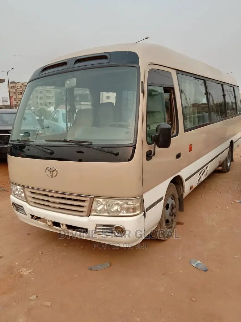 Toyota Coaster 2012 Gold