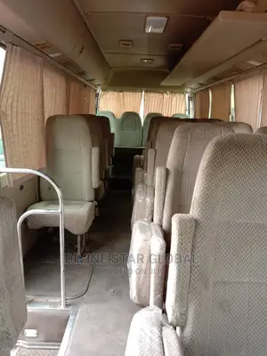 Toyota Coaster 2012 Gold