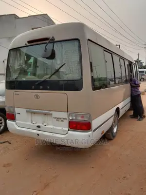 Toyota Coaster 2012 Gold