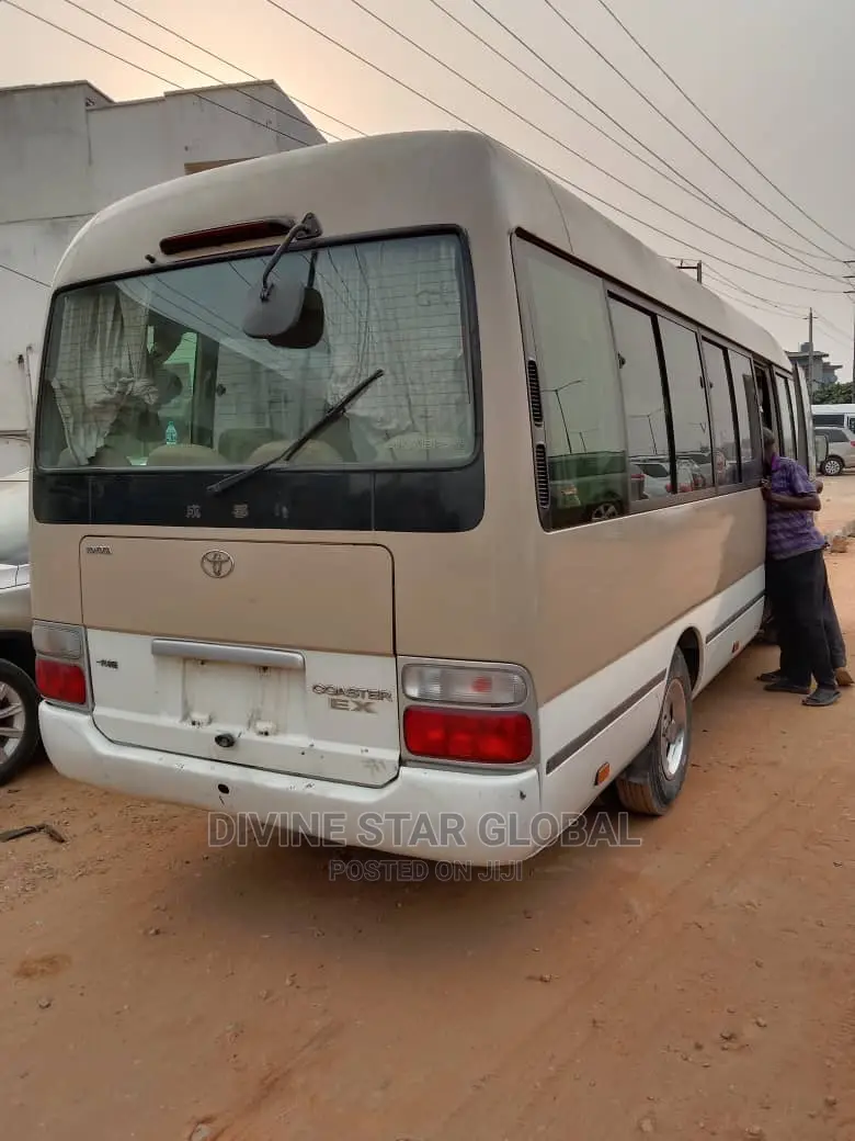 Toyota Coaster 2012 Gold