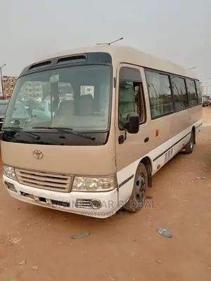 Toyota Coaster 2012 Gold