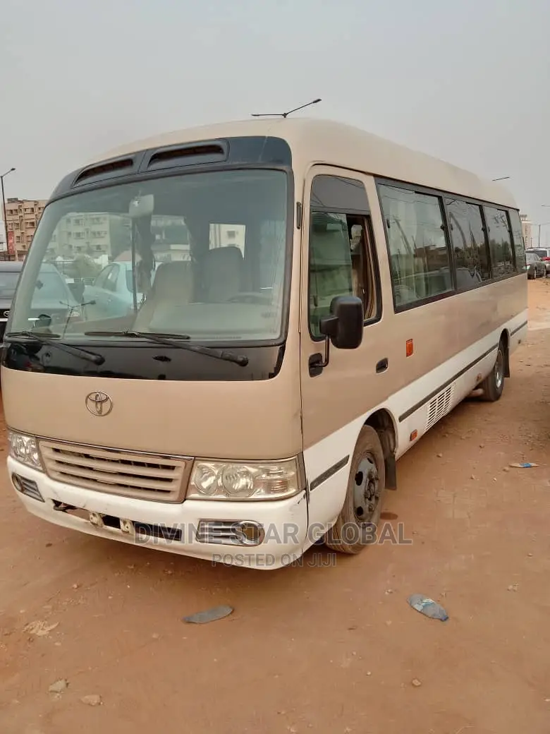 Toyota Coaster 2012 Gold