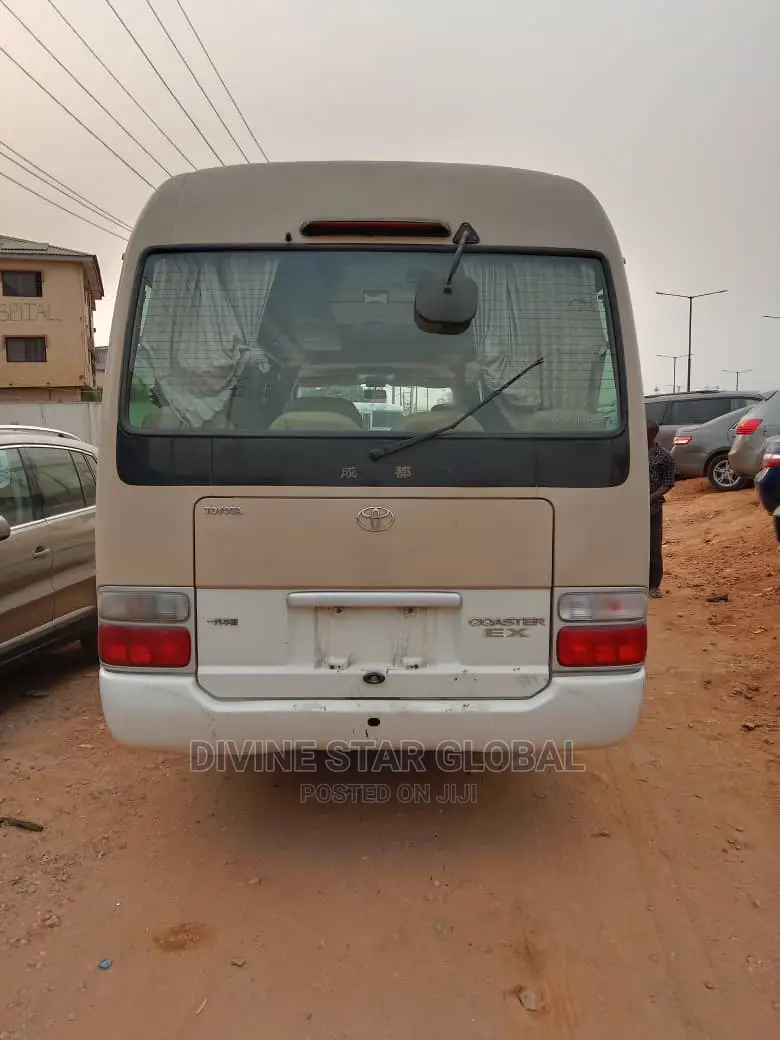 Toyota Coaster 2012 Gold