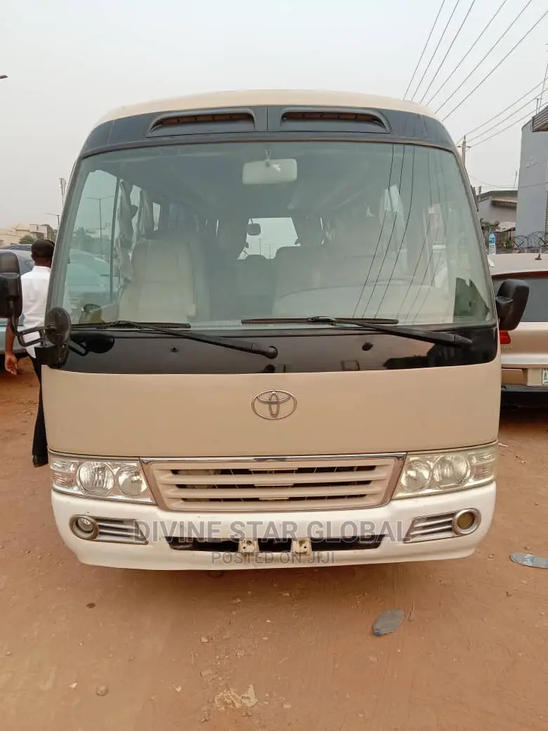 Toyota Coaster 2012 Gold