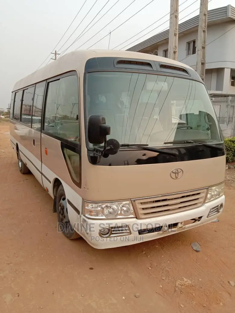 Toyota Coaster 2012 Gold