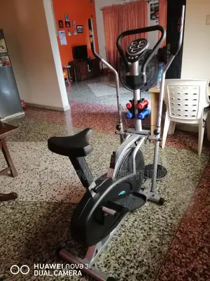 Orbitrac Bike With Dumbells