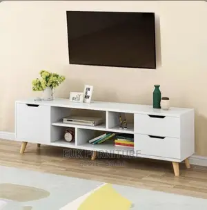 Unique Tv Stand With Carved Openings on Each Drawers