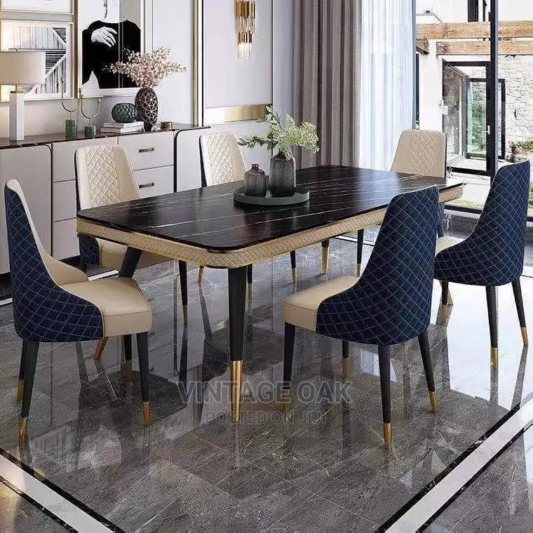Foreign Dining Table With 6 Superior Chairs.