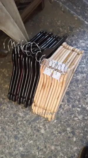 Black Color and Brown Wooden Clothes Hangers