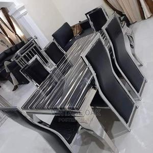 Classic Dining Table With 6 Luxury Chairs in Black Colours.