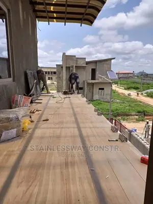 Frameless Dark Grey Glass Balcony Railing at Jahi