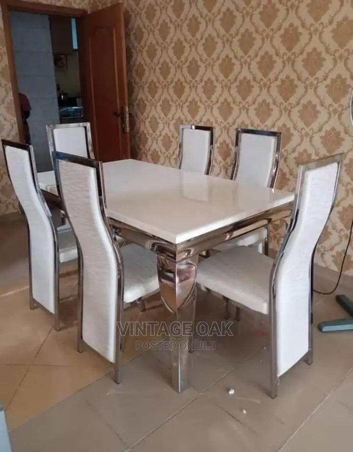 Exclusive Marble Dining Table With 6 Chairs.