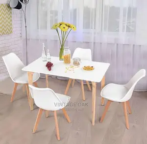 Classic Modern Dining Table With 4 Padded Chairs.