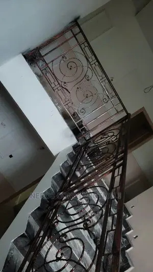 Curly Rail Wrought Iron Design