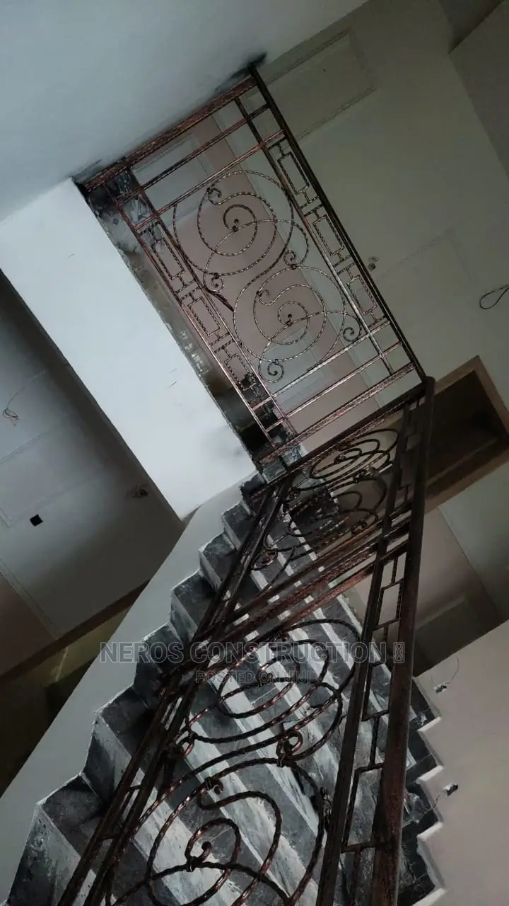Curly Rail Wrought Iron Design