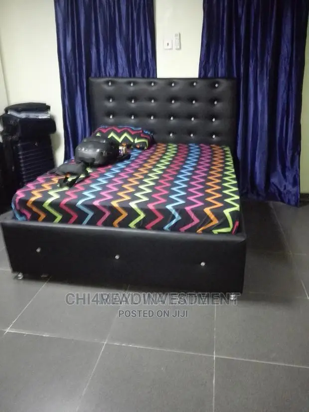 6 by 6 BEDFRAME WITH MATTRESS.