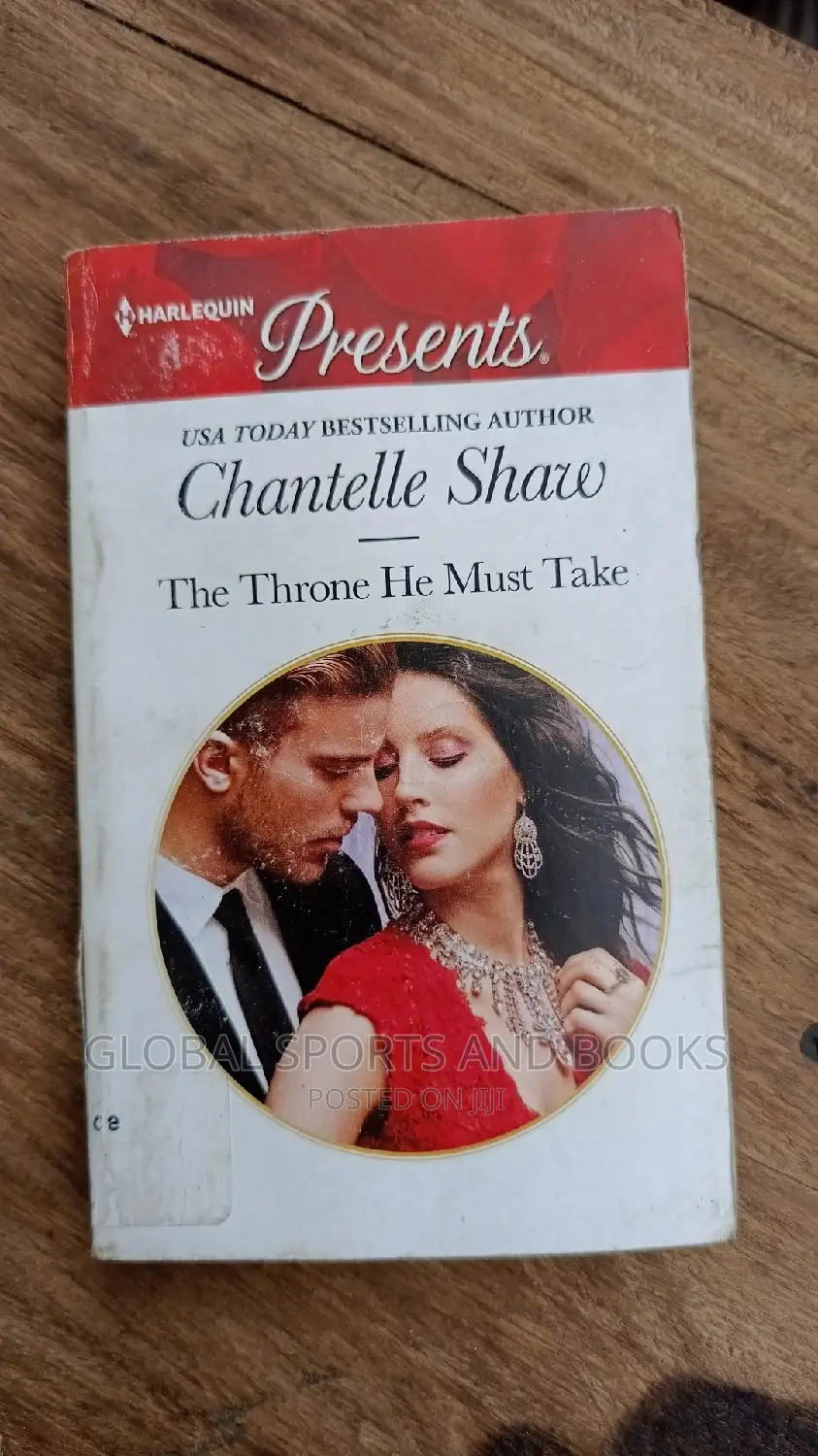 Harlequin Present Red and White Romance Novel