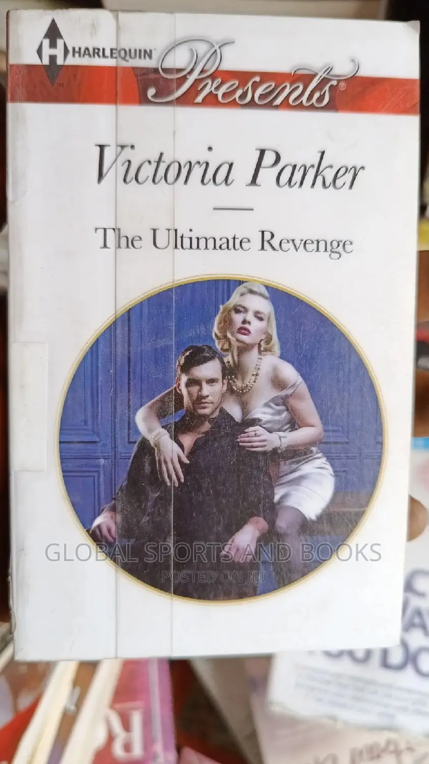 Harlequin Present Red and White Romance Novel
