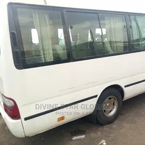 Toyota Coaster 2012 Gold