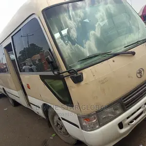 Toyota Coaster 2010 Gold